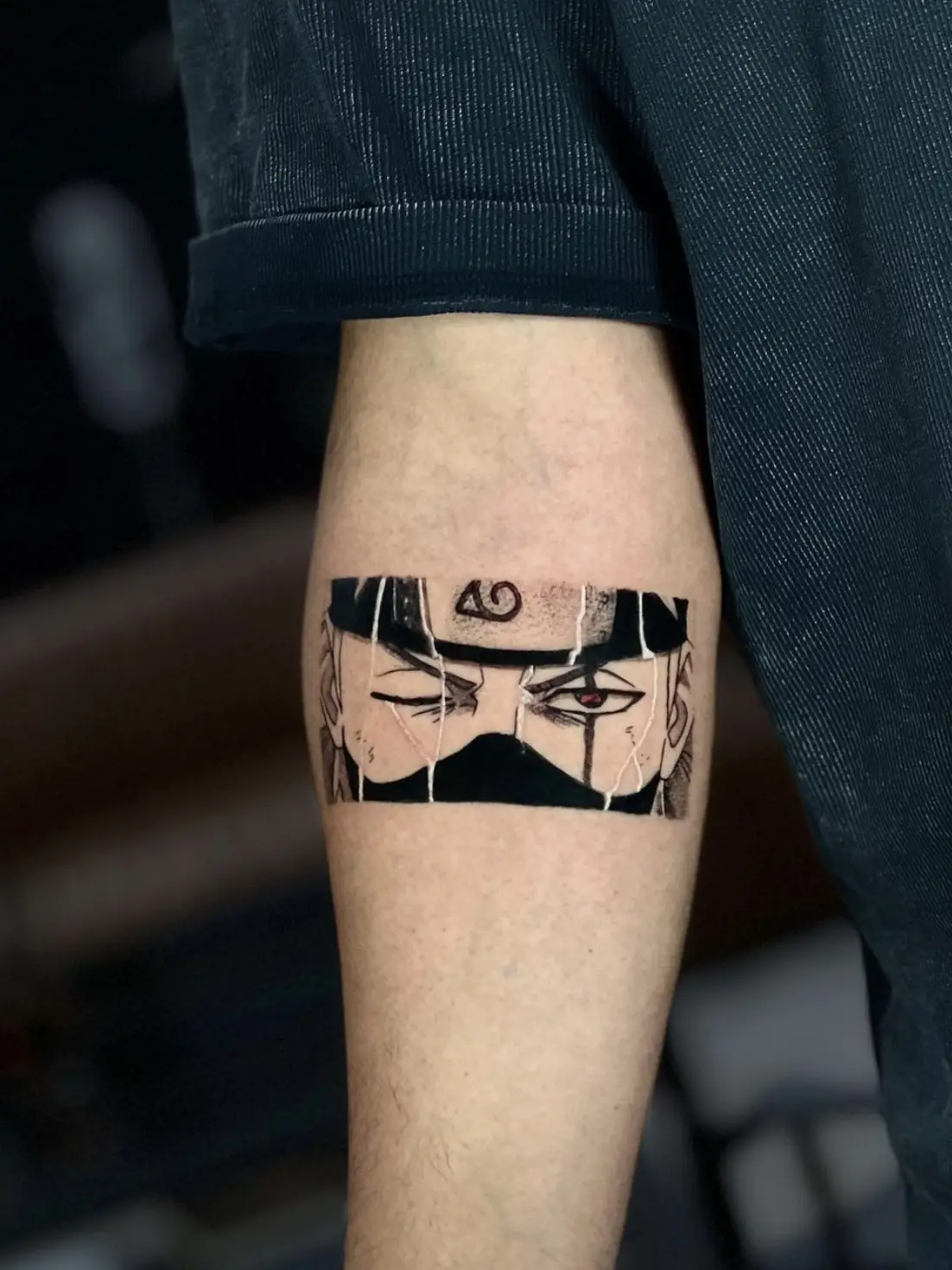 Kakashi ANBU mask tattoo with minimal rectangular framing by Sara at Omnia Tattoo Melbourne